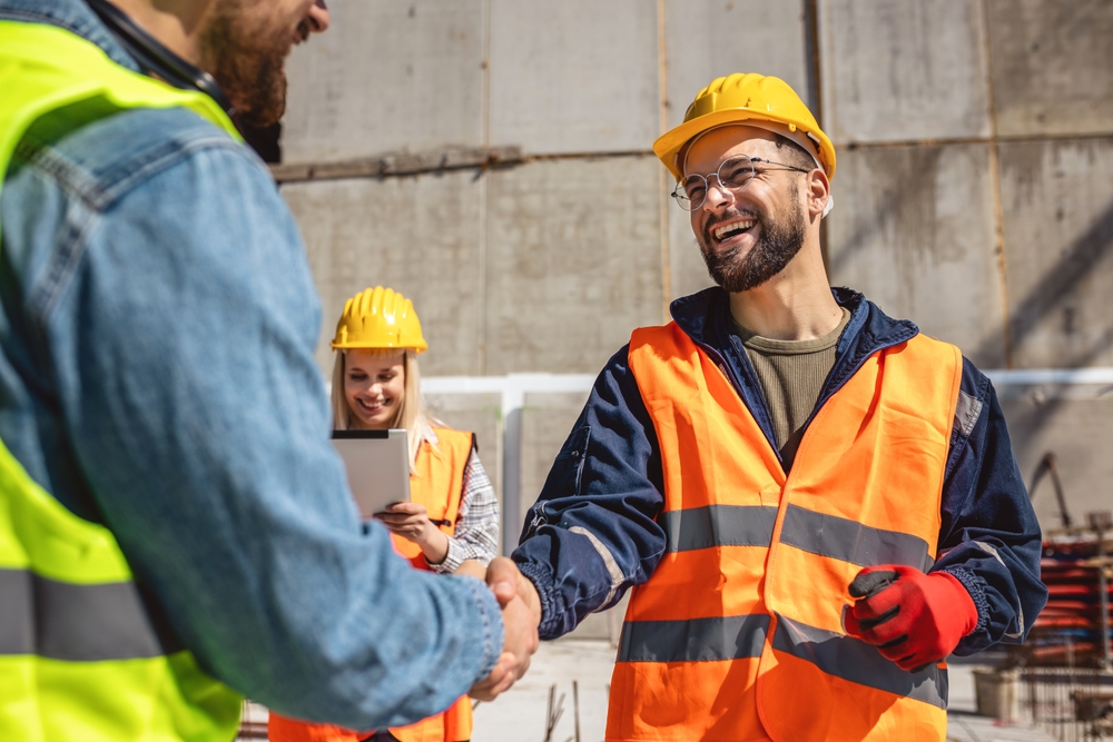 Contractor.,Construction,Worker,Team,Hands,Shaking,After,Plan,Project,Contract