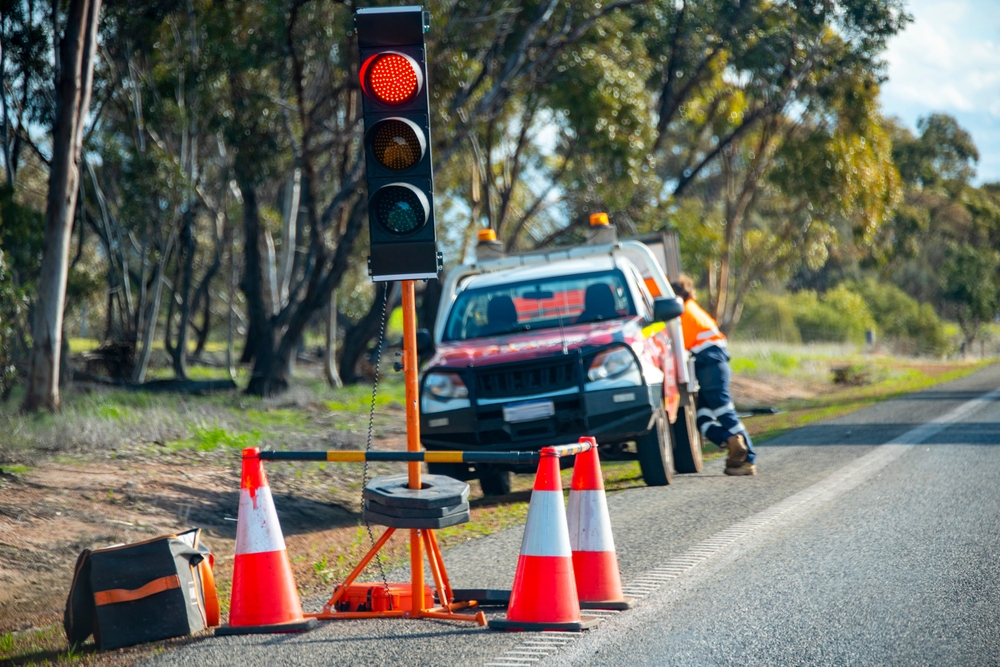Road,Construction,Traffic,Controller,On,The,Highway
